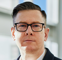 Alexander Hughes, chief executive of a cryptocurrency trading platform, posed for a headshot